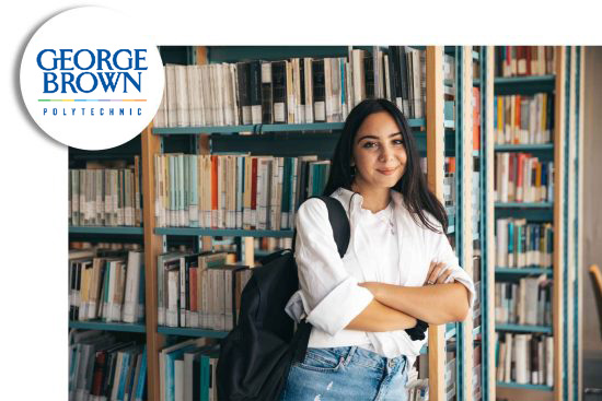 Student standing confidently in a library with bookshelves behind her, wearing a backpack, with the George Brown College logo in the corner.